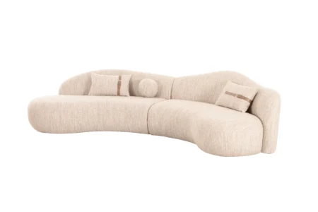 Sharelle Melano curved sectional sofa upholstered in textured bouclé fabric.