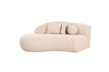 Sharelle Melano Curved Sectional Sofa upholstered in textured bouclé fabric in a modern living room